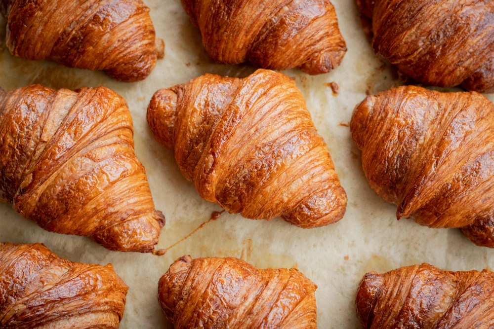 A tray of golden croissants