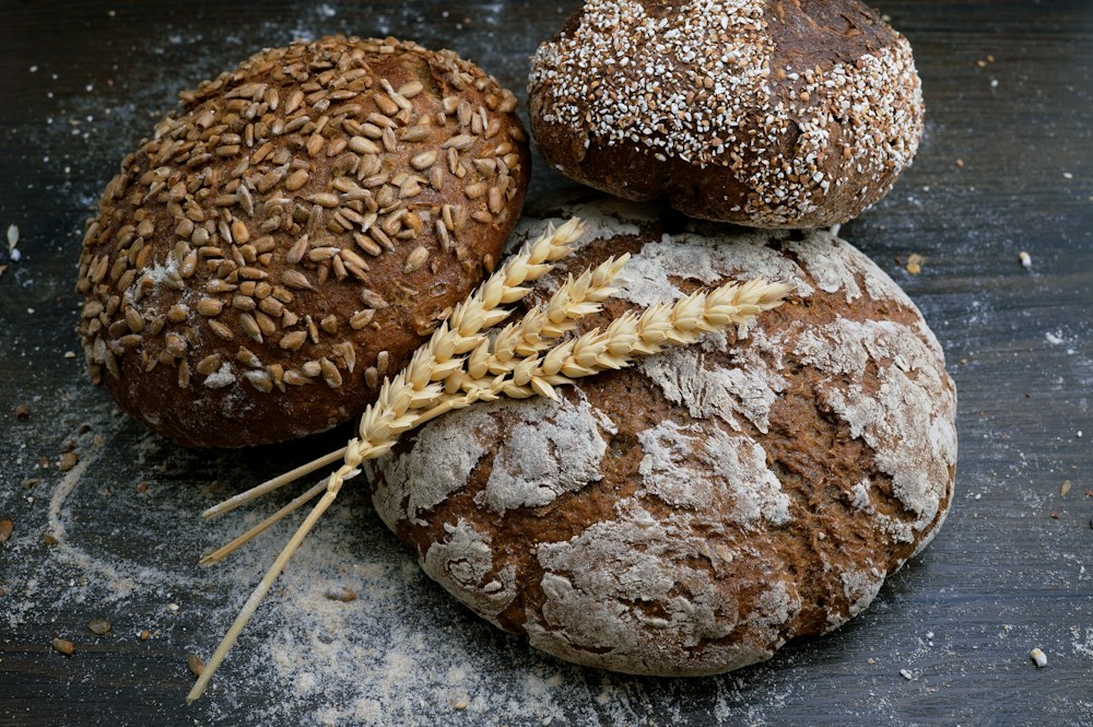 Rustic sourdough loaves with wheat stalks